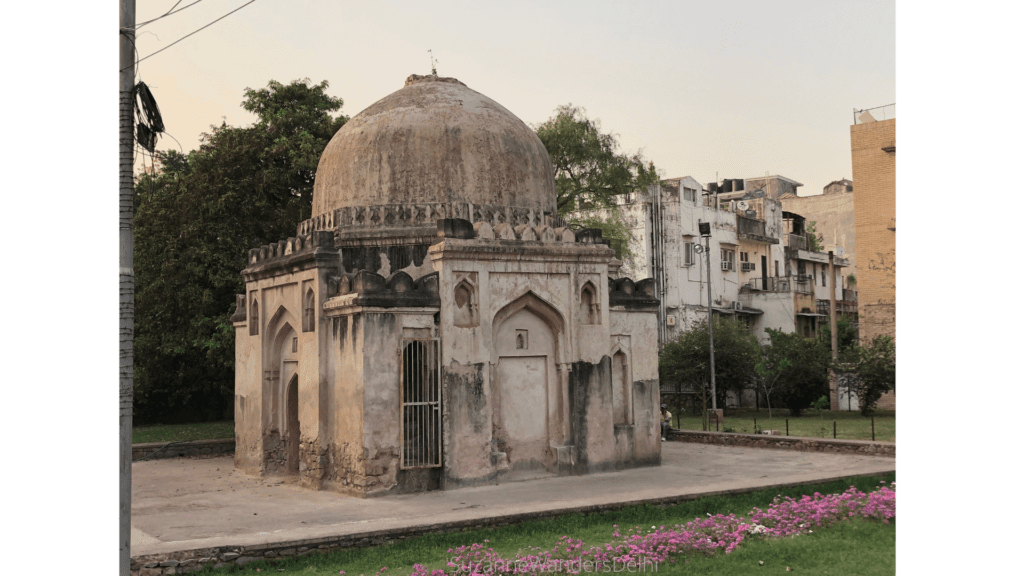 Choti Bumti tomb in Green Park with pink flowers in foreground