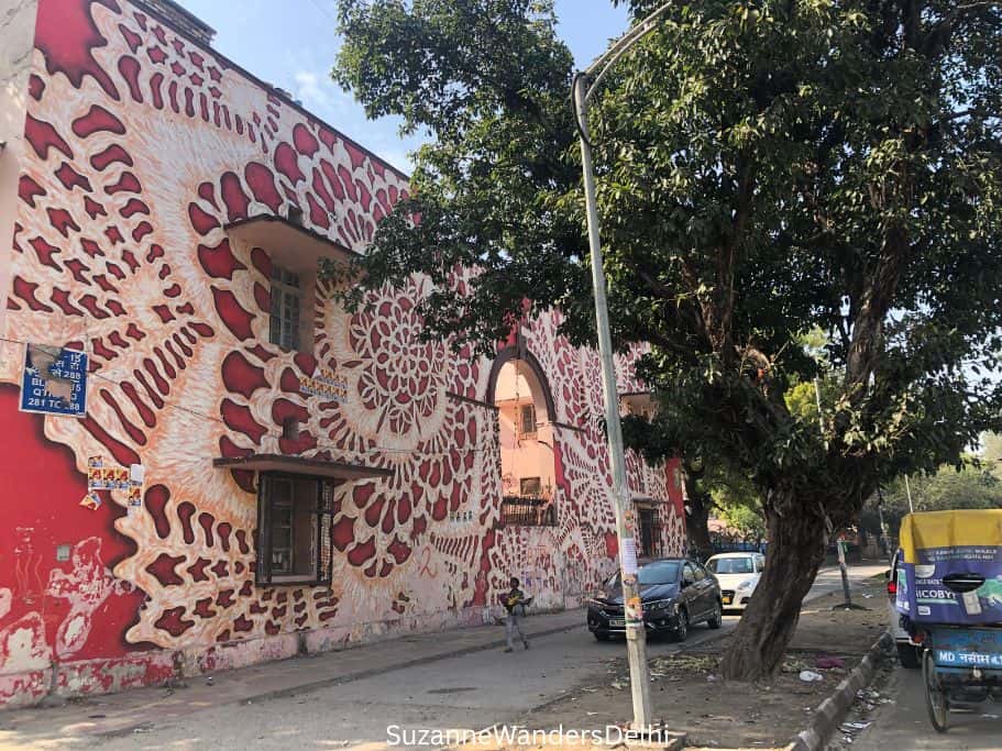 colourful floral mural in reds and orange in Lodhi Colony, Delhi