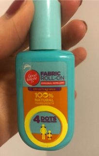 A bottle of 4 Dots natural mosquito repellent 