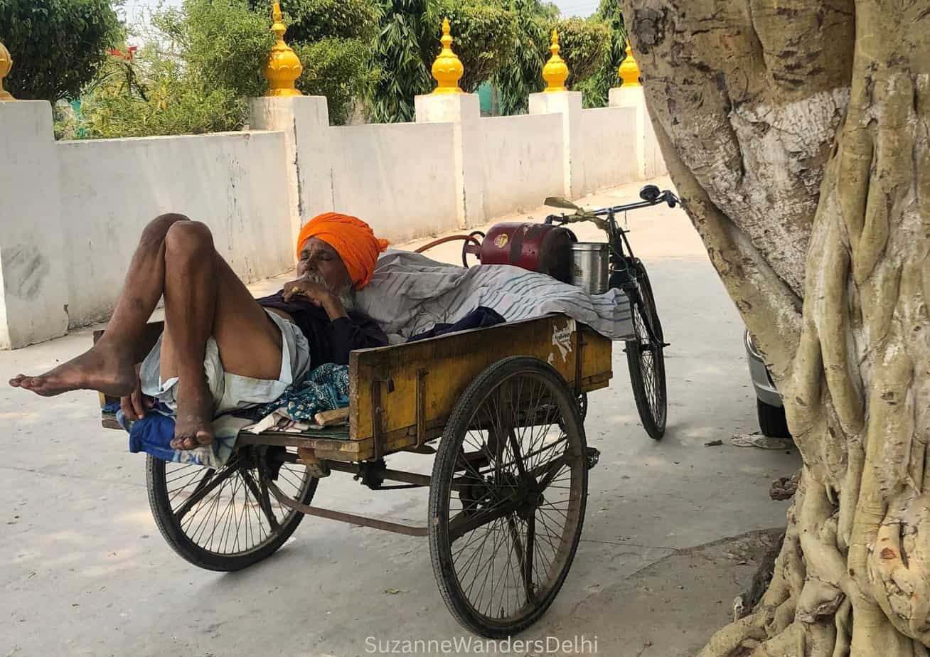 taking a nap outside a gurudwara in Delhi