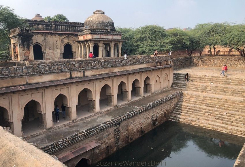 View of stepwell with surrounding arches and pavilions