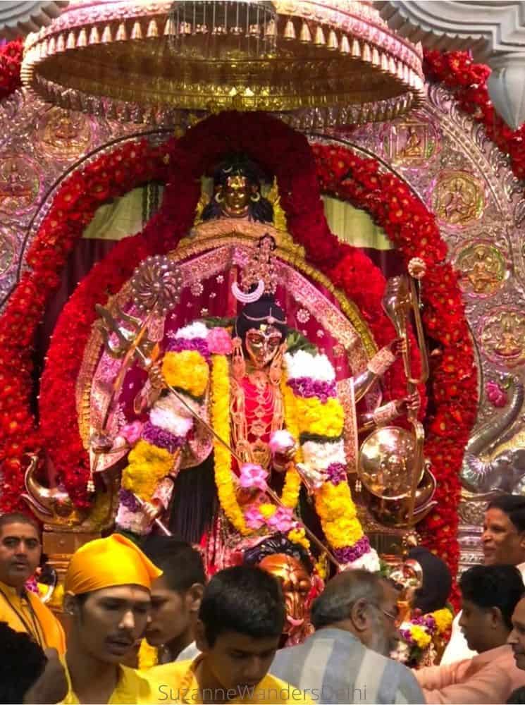 Katyayani Devi all dressed and enrobed in huge flower garlands during Navratra