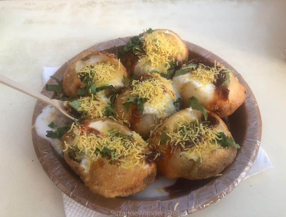 a plate of dah puri, a favourite Delhi street food