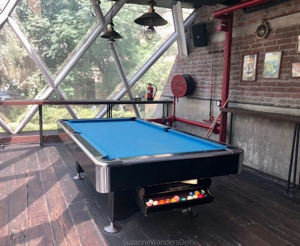 Pool table in daytime / The Best Party Places in Delhi