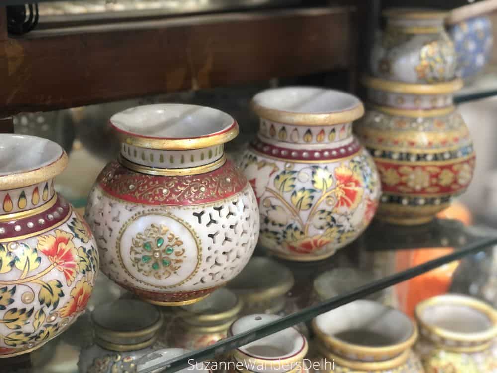 Close up of marble inlay vases at the Rajasthan state emporium on Baba Kharak Singh Road, one of the best places for a first timer in Delhi to shop at