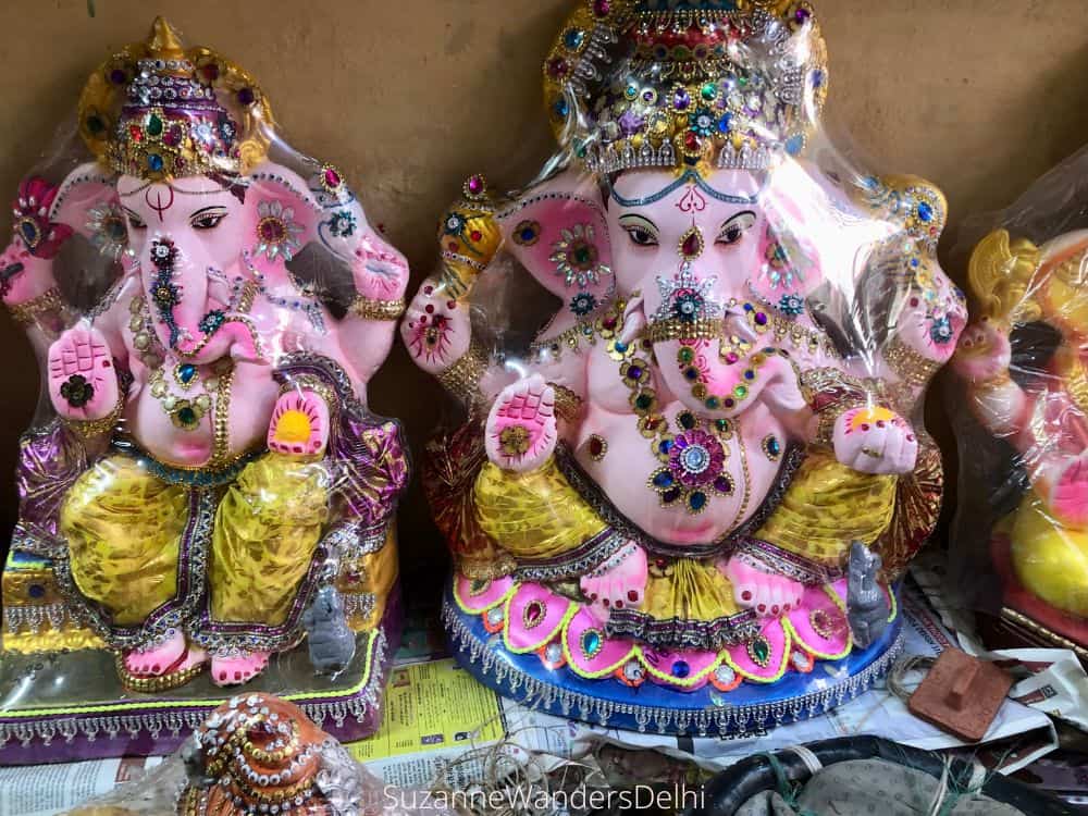 A row of Lord Ganesha statues for sale in Kumhar Colony, one of the best off the beaten path sites in Delhi