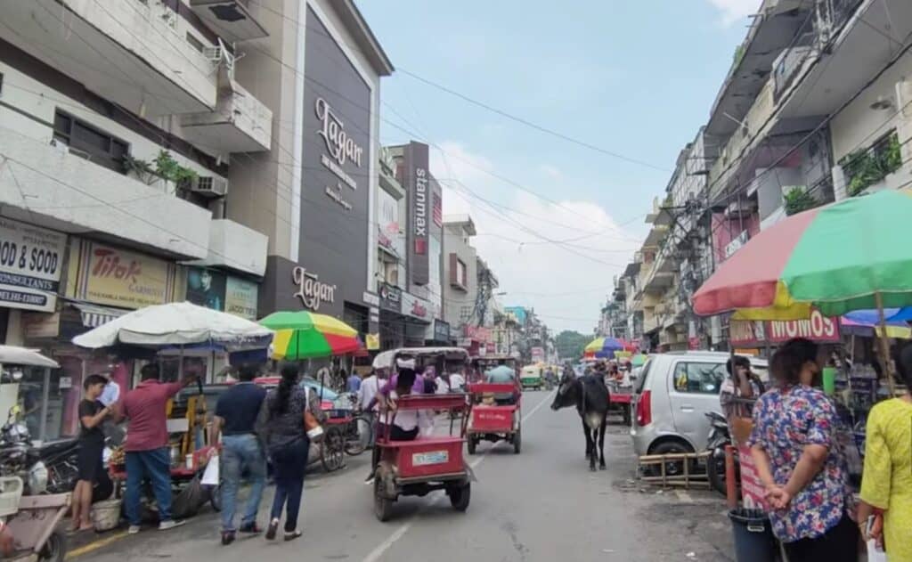 Street view of Kamla Nagar Market during the day