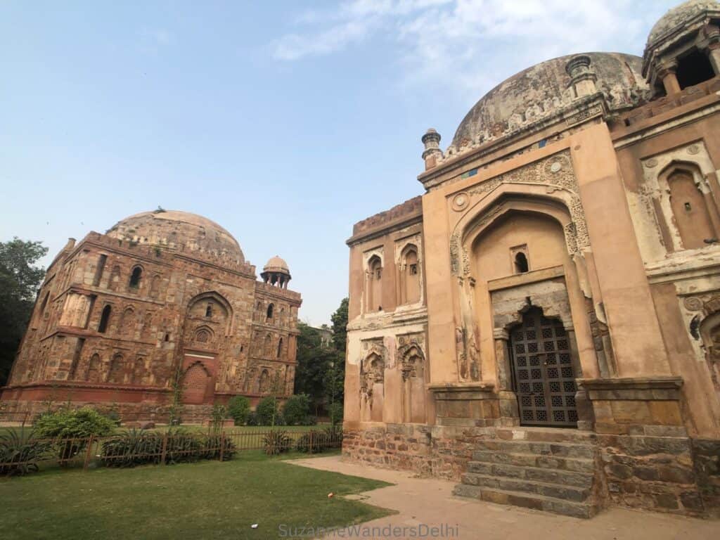 Bade and Chote Khan tombs side by side with blue sky.