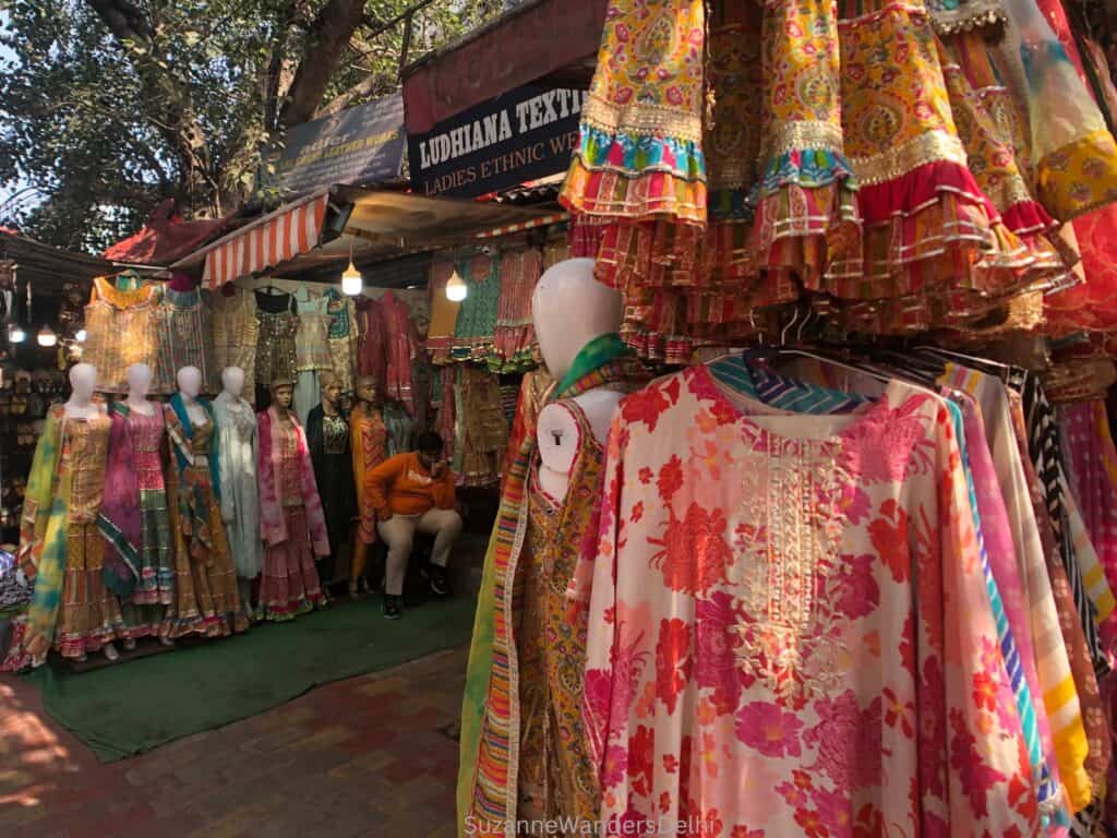 Outdoor displays of colourful women's Indian fashion in Central Market Lajpat Nagar, one of the best and cheapest markets in Delhi