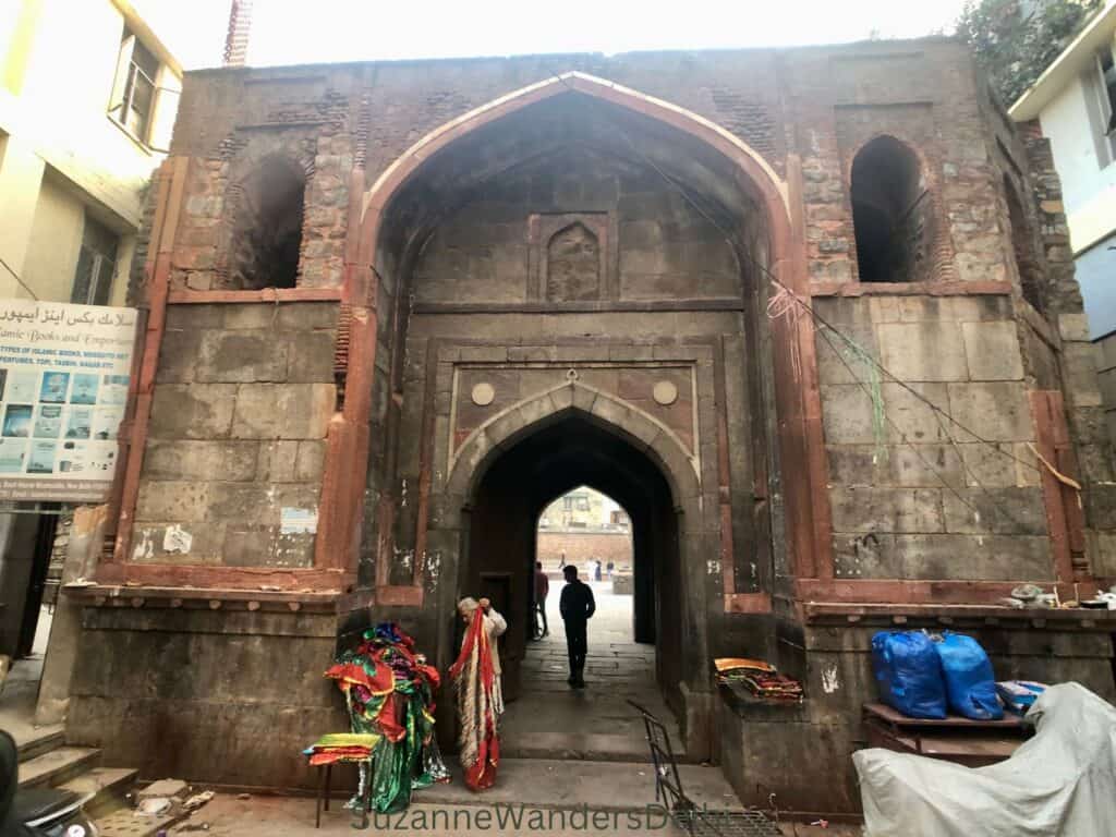 The massive stone arched entrance gateway to Chausath Khamba 