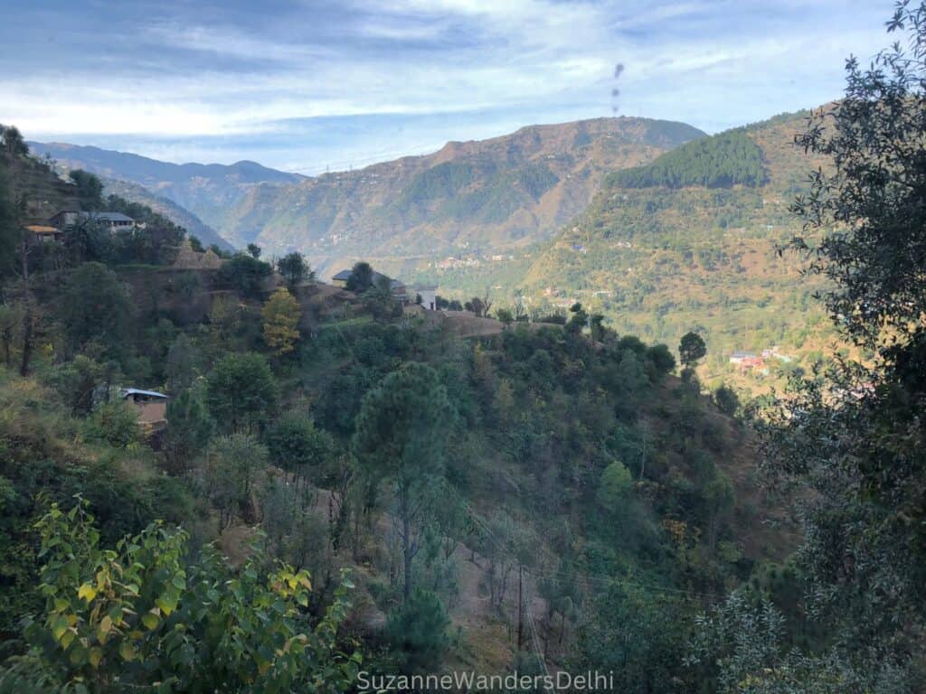 View of mountain valley, all green and blue sky