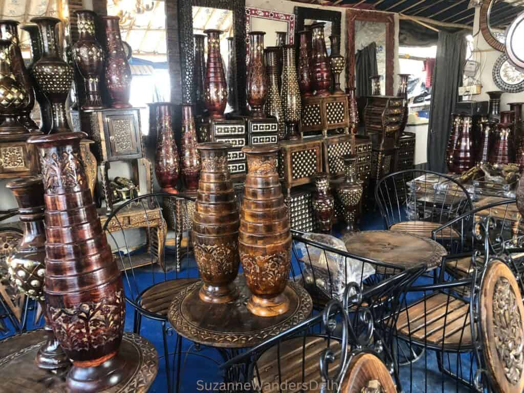 A selection of wooden home decor items on display for sale