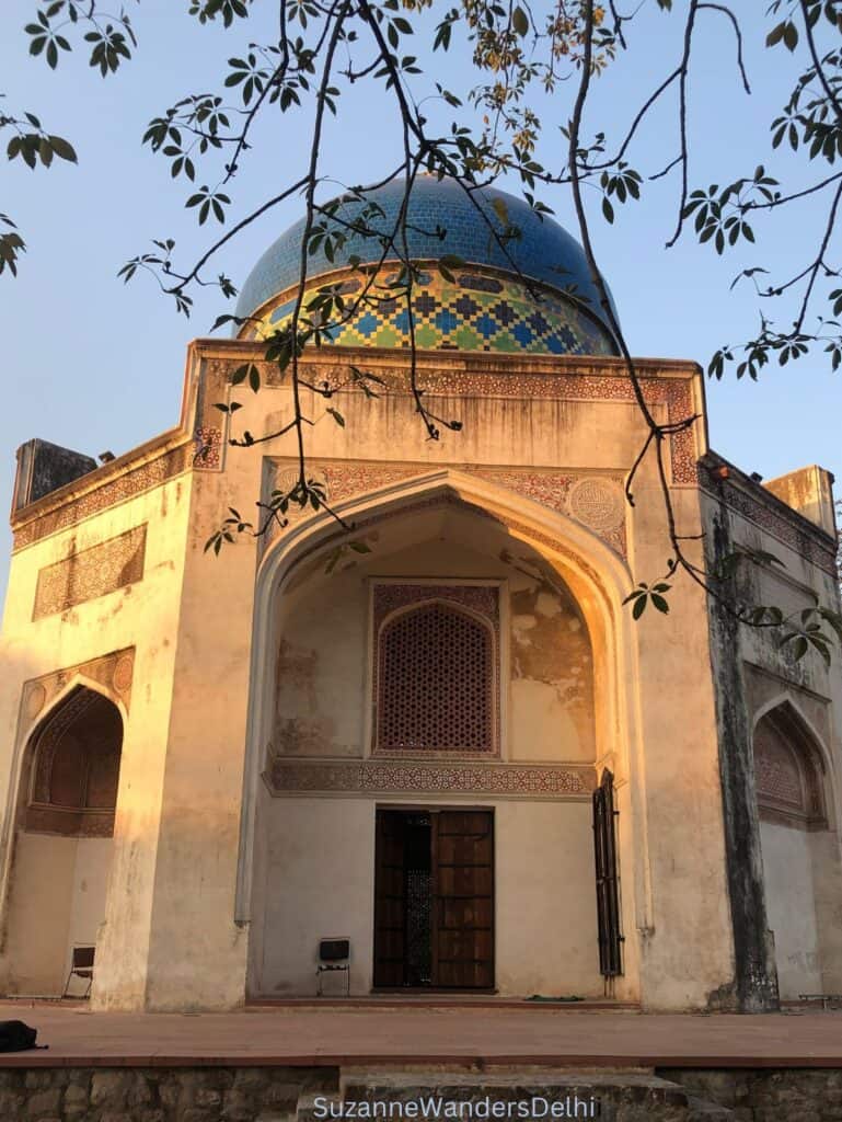 Exterior view of Sabz Burj with blue and green tiled dome, one of the most striking off the beaten path sites in Delhi