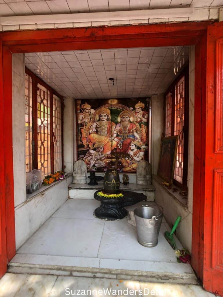 Shiva and Parvati temple with images of Shiva and Parvati and lingam adorned with flowers in Neem Karoli Baba Ashram