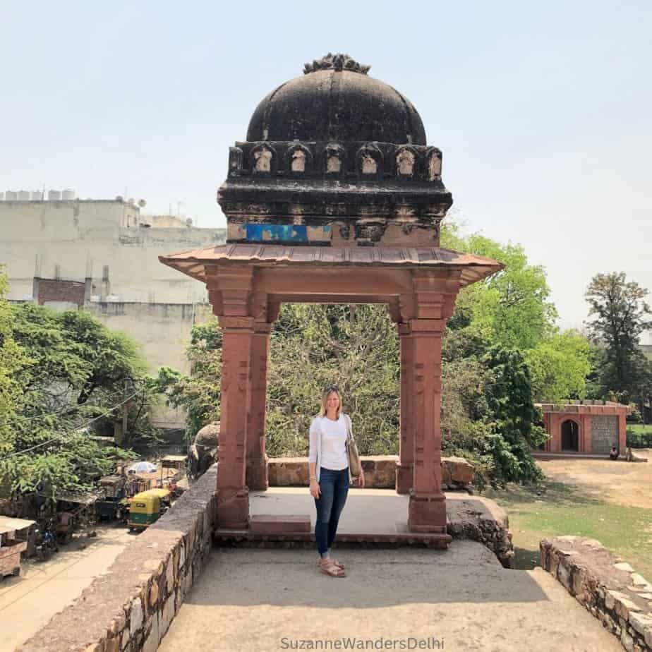 The author standing under a chaatri on the roof of Jahaz Malal - the old ruins are one of the reasons Delhi is worth visiting