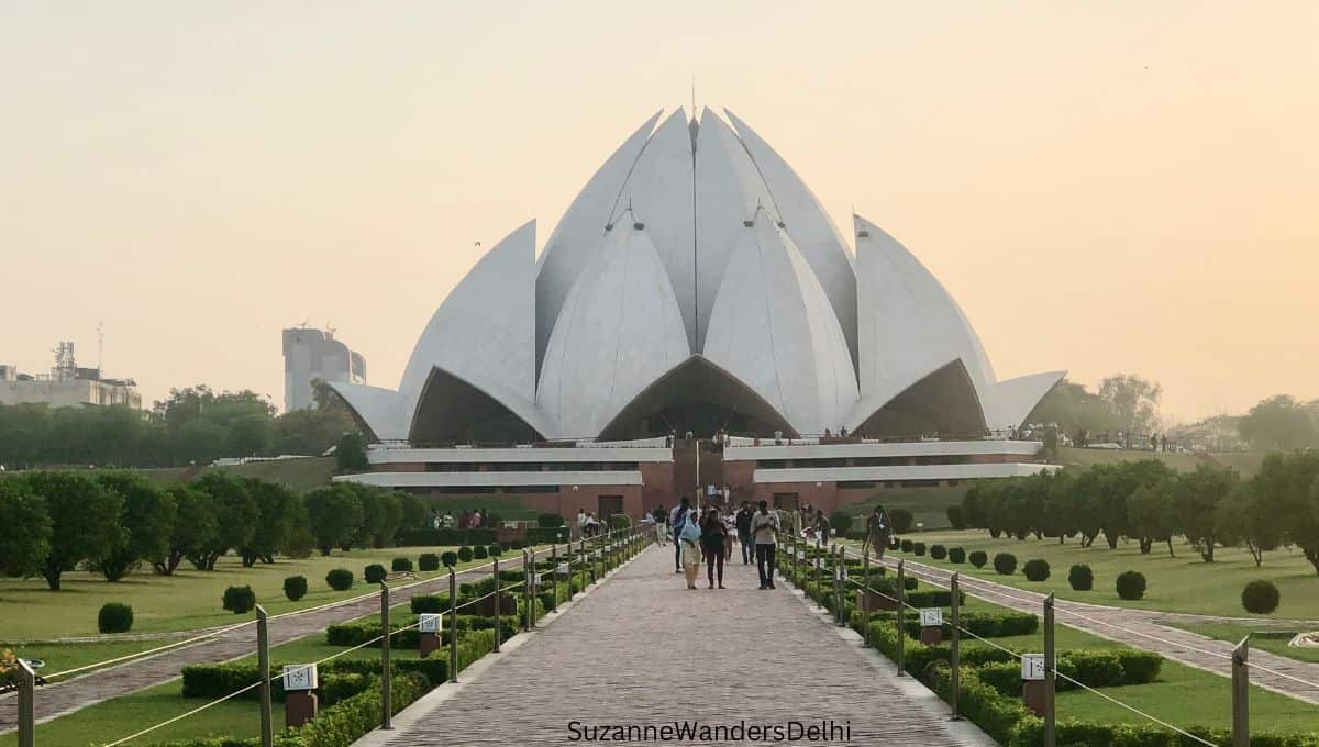 Long shot of the Bahai Lotus Temple in Delhi with front walkway