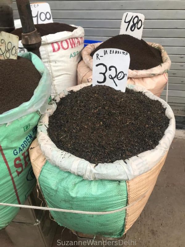 sacks of loose green tea in Delhi's spice market