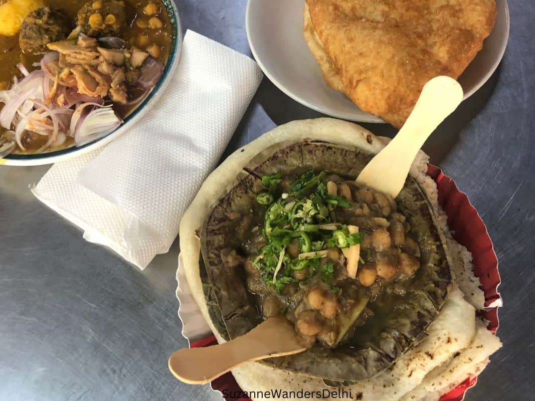 plates of chole kulcha, chole kofta and bhature at Bhogals in Connaught Place, Delhi