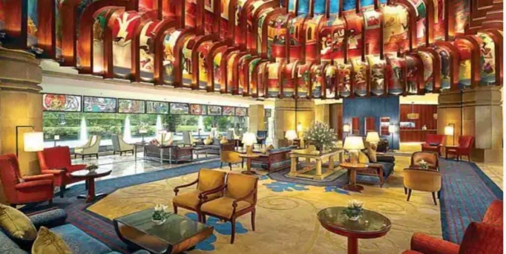the lobby of the ITC Maurya, featuring the mural by Krishen Khanna - this is one of hotels in Delhi with a jacuzzi