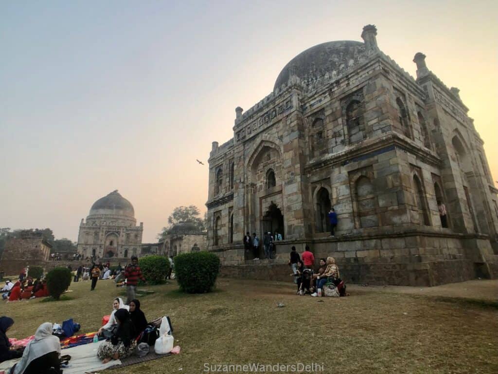 families picnicking in front of the tombs in Lodhi Garden