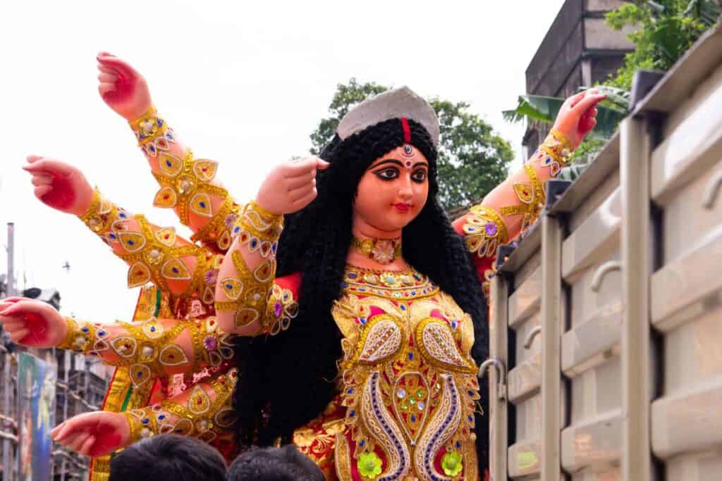 Effigy of the goddess Durga outside being transported for Durga Puja in Delhi