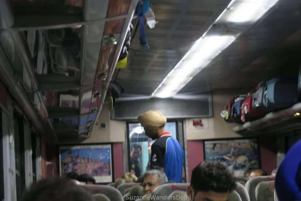 Dominoes Pizza delivery man inside the Shatabdi Express train, the best way to travel from Delhi to Jaipur