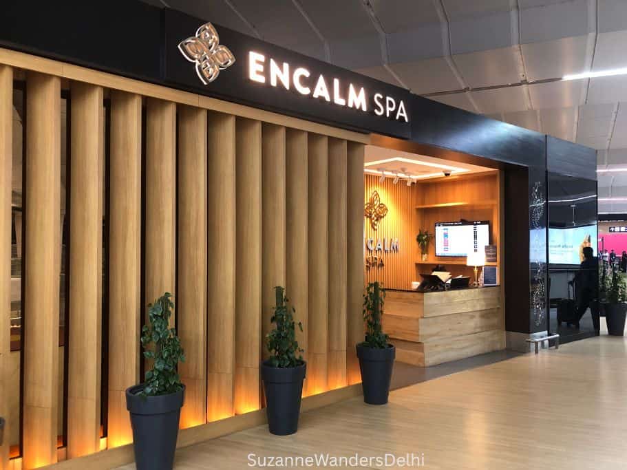entrance to Encalm Spa with potted plants in front
