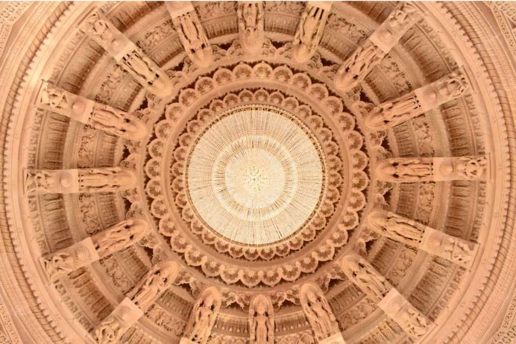 An intricately carved domed ceiling at Akshardham, New Delhi
