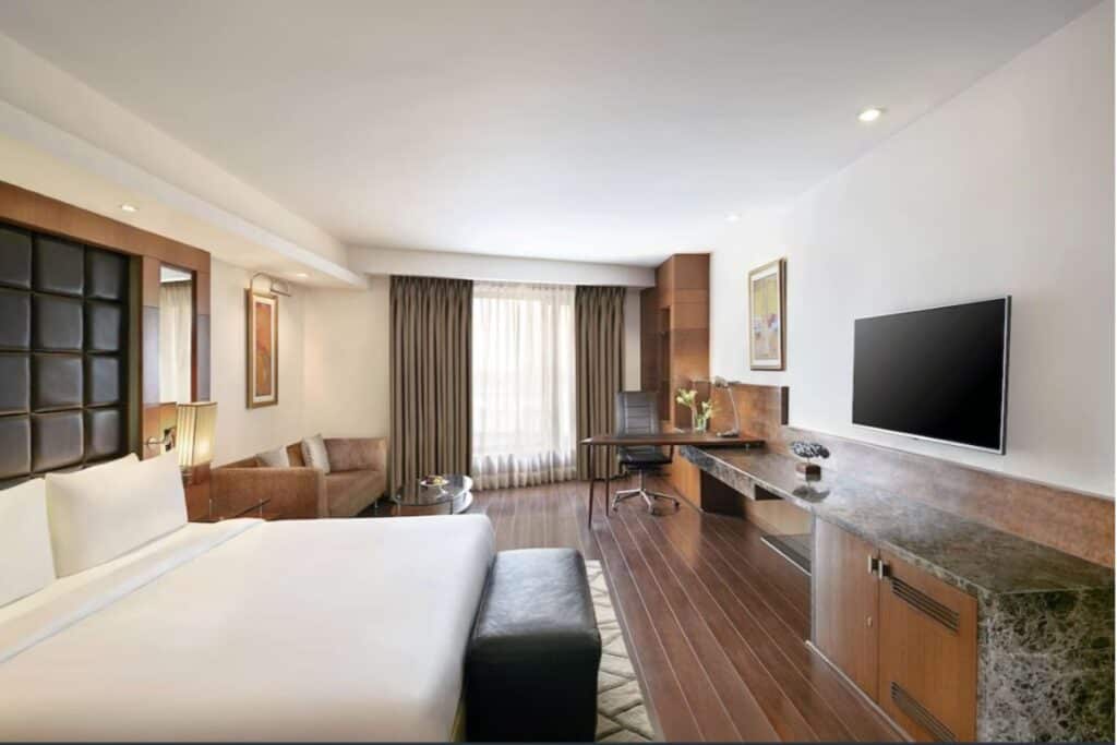 large room with king size bed in Radisson Blu Plaza Delhi, one of the better hotels near the airport