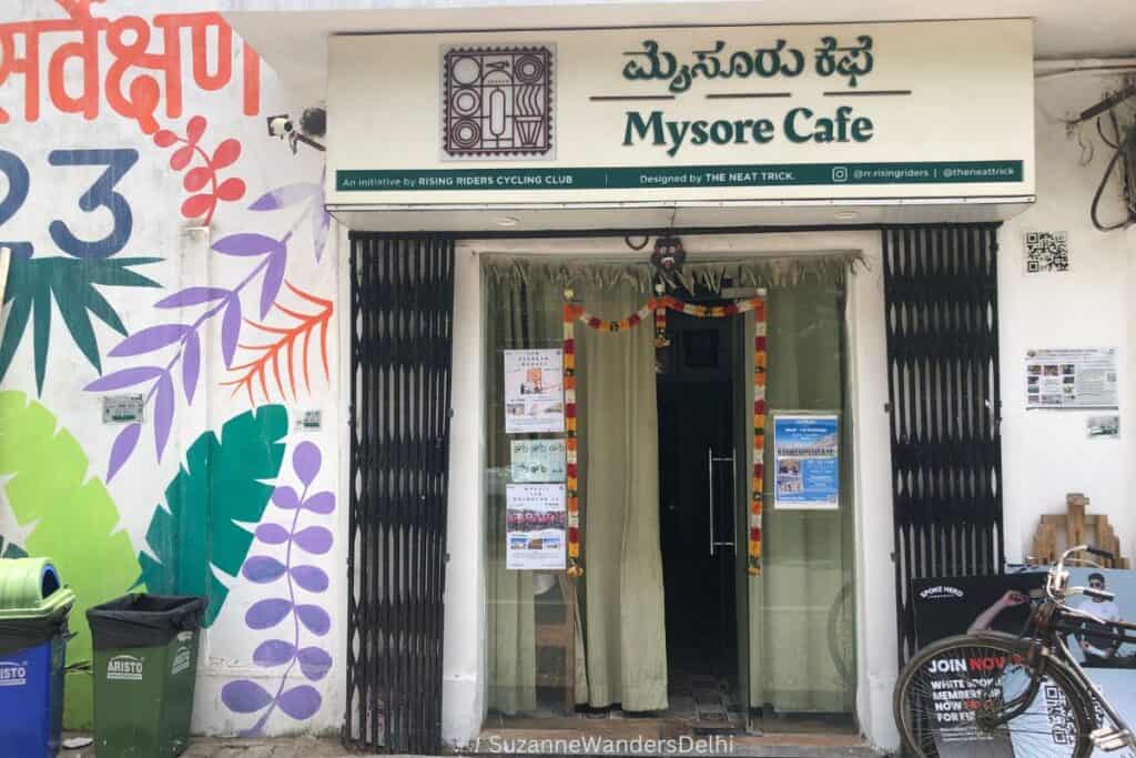 entrance to Mysore Cafe with colourful mural in Delhi