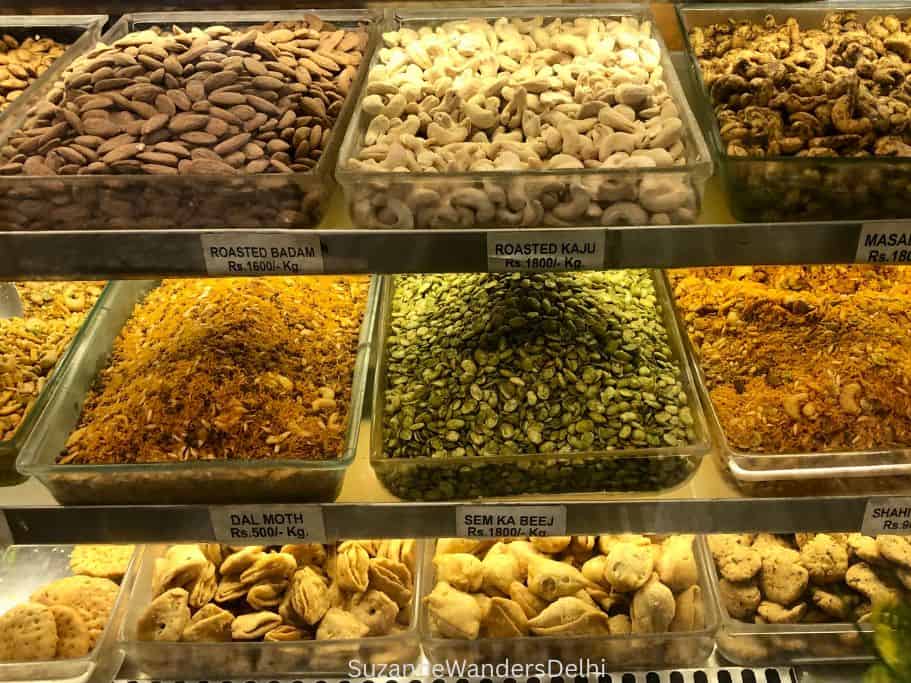 close up of nuts and seeds selection in display cabinet at Bengali Sweet Centre in Delhi