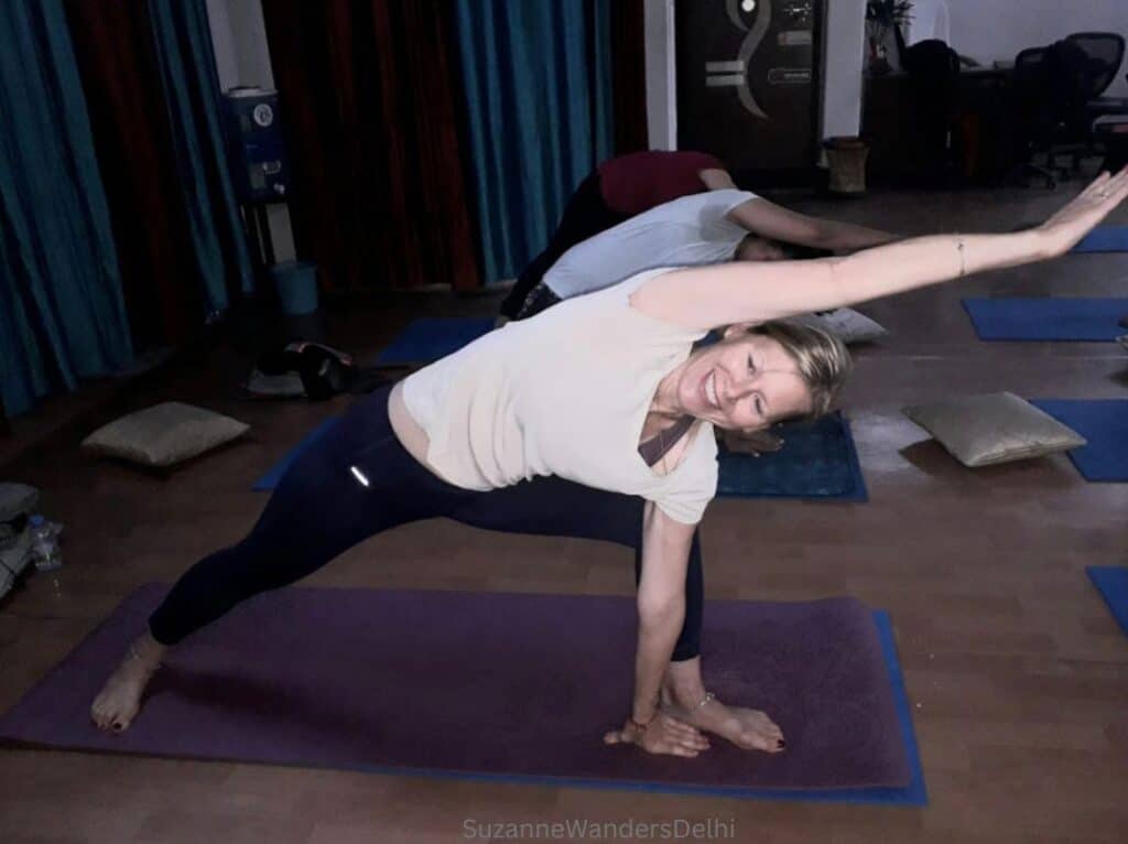 the author doing a yoga asana in her Delhi class