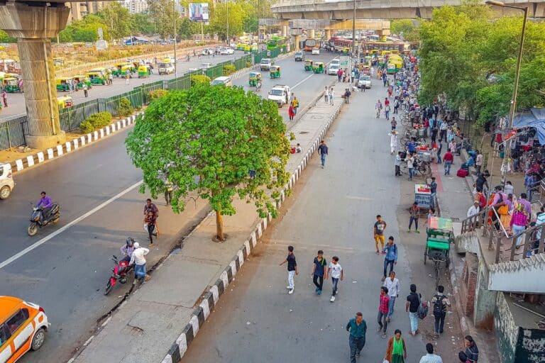 divided road from elevated view in Delhi, with pedestrians