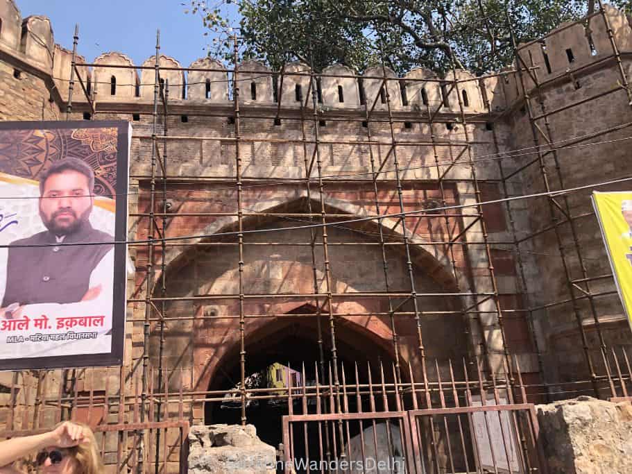 front view of Turkmen Gate with billboard in front