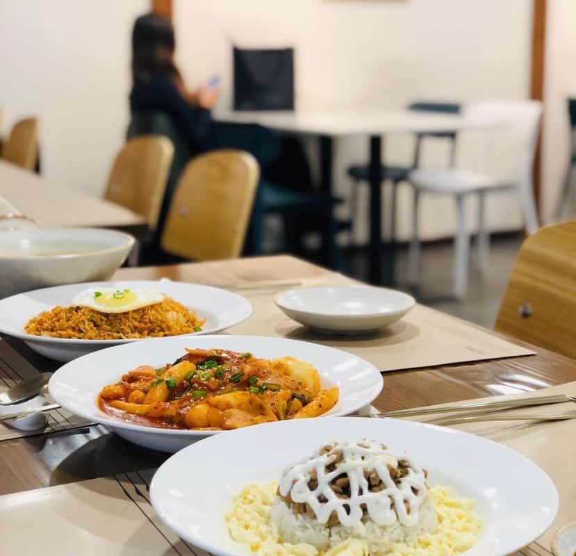 3 plates of food in Dalgrak, the restaurant in the Korean Cultural Centre in Delhi