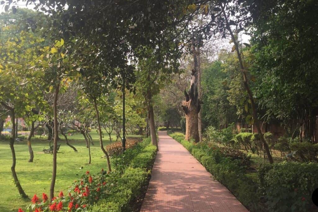 walking path through the flower gardens at Talkatora Gardens in Delhi