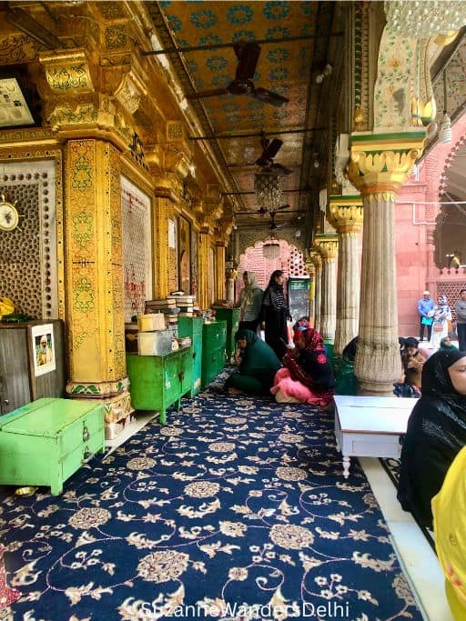 carpeted and covered area outside of the tomb of Nizamuddin Auliya in Delhi