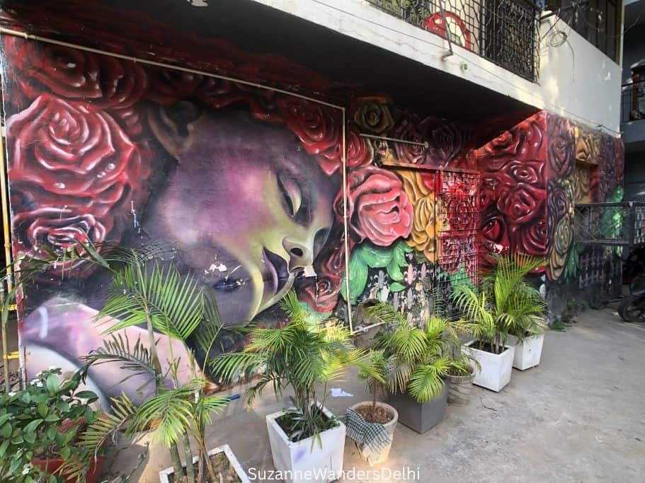 colourful full wall mural in Shahpur Jat, one of the urban villages in Delhi